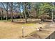Expansive green space with walking path, trees, and benches, providing a peaceful outdoor setting at 130 26Th Nw St # 615, Atlanta, GA 30309