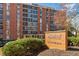 Brick condo building with large windows and a sign for Brookwood Park Condominiums at 130 26Th Nw St # 615, Atlanta, GA 30309