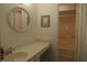 Traditional bathroom featuring a white sink and vanity with shower and tub at 1932 Variations Ne Dr, Atlanta, GA 30329