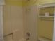 This bathroom has a tub and built in shelving at 1932 Variations Ne Dr, Atlanta, GA 30329
