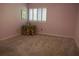 Bedroom featuring carpet and plantation shutters at 1932 Variations Ne Dr, Atlanta, GA 30329