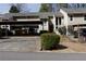 Exterior view showcasing the home's architecture, with a carport and inviting front entrance at 1932 Variations Ne Dr, Atlanta, GA 30329