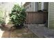 A low-maintenance yard in partial shade surrounds the property at 1932 Variations Ne Dr, Atlanta, GA 30329