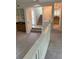 Spacious living room with wet bar, stairway, and neutral carpeting for a modern look at 1932 Variations Ne Dr, Atlanta, GA 30329
