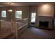 Living space featuring staircase, dining area, fireplace and ample natural light for a welcoming atmosphere at 1932 Variations Ne Dr, Atlanta, GA 30329