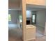 Open concept living space showcasing staircase, fireplace and ample light at 1932 Variations Ne Dr, Atlanta, GA 30329