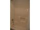 A well-maintained shower features a clean, neutral-colored surround and a convenient grab bar at 1932 Variations Ne Dr, Atlanta, GA 30329