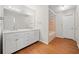 Bathroom featuring double vanity, tile floors, walk-in shower and separate tub at 395 Lake Swan Ct, Hiram, GA 30141