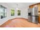 Bright eat-in kitchen with stainless steel appliances and access to backyard at 395 Lake Swan Ct, Hiram, GA 30141
