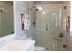 Clean bathroom featuring a glass-enclosed shower and neutral color palette at 1165 E Beechwood Nw Dr, Atlanta, GA 30327