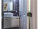 Charming bathroom features a modern vanity with stylish tiling and fixtures at 1165 E Beechwood Nw Dr, Atlanta, GA 30327