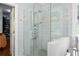 Stylish bathroom boasts a glass shower enclosure and modern fixtures at 1165 E Beechwood Nw Dr, Atlanta, GA 30327