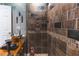 Bathroom featuring a modern vessel sink, decorative tiles, and a spacious shower for a spa-like experience at 1165 E Beechwood Nw Dr, Atlanta, GA 30327