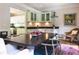 The dining area features a dark wood table with seating for six and unique lighting and decor at 1165 E Beechwood Nw Dr, Atlanta, GA 30327