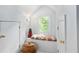 Cozy hallway nook with window seat and charming decor at 1165 E Beechwood Nw Dr, Atlanta, GA 30327
