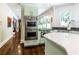 Gourmet kitchen featuring stainless steel appliances and plenty of counter space at 1165 E Beechwood Nw Dr, Atlanta, GA 30327
