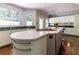 Modern kitchen with quartz countertops, large island, and stainless steel appliances at 1165 E Beechwood Nw Dr, Atlanta, GA 30327