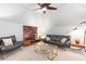 Lofted living room area with modern furnishings and eye-catching decor at 1165 E Beechwood Nw Dr, Atlanta, GA 30327
