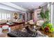 Spacious living room with hardwood floors, fireplace, and stylish decor at 1165 E Beechwood Nw Dr, Atlanta, GA 30327