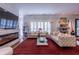 Elegant living room featuring tufted sofas, fireplace, and plenty of natural light at 1165 E Beechwood Nw Dr, Atlanta, GA 30327