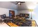 Vaulted living room with modern furniture and decor, including a colorful area rug at 1165 E Beechwood Nw Dr, Atlanta, GA 30327