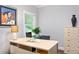 Bright office space with large windows, a spacious desk, and ample storage at 1165 E Beechwood Nw Dr, Atlanta, GA 30327