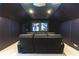 A fully equipped home theater provides a cinematic viewing experience with plush seating at 1165 E Beechwood Nw Dr, Atlanta, GA 30327