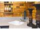 A close-up of the wet bar area, highlighting the sink, countertop, and decor elements at 1165 E Beechwood Nw Dr, Atlanta, GA 30327