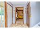 Bright foyer with tile flooring, neutral walls, and an entry to the living room at 175 Heritage Farm Ln, Fayetteville, GA 30215