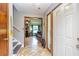 Inviting foyer with tile flooring, neutral walls, and a glimpse into the living room at 175 Heritage Farm Ln, Fayetteville, GA 30215