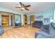 Spacious living room with hardwood floors and neutral paint, offering a comfortable gathering space at 175 Heritage Farm Ln, Fayetteville, GA 30215