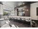 Chic bar area with modern pendant lights, a long countertop, and stylish stools at 3324 Peachtree Rd # 2717, Atlanta, GA 30326