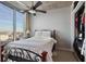 Bedroom with built in closet, large window and ceiling fan at 3324 Peachtree Rd # 2717, Atlanta, GA 30326