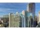 Exterior showcases modern high-rise architecture with glass windows and private balconies at 3324 Peachtree Rd # 2717, Atlanta, GA 30326
