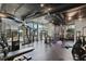 Well-equipped fitness center with modern exercise machines and ample natural light at 3324 Peachtree Rd # 2717, Atlanta, GA 30326