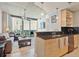 Open floorplan with modern kitchen looking out to living area and city views at 3324 Peachtree Rd # 2717, Atlanta, GA 30326