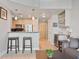 Inviting living space with open layout, bar area, and kitchen, perfect for entertaining at 3324 Peachtree Rd # 2717, Atlanta, GA 30326