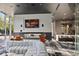 Modern lounge area includes a large sectional sofa, fireplace, and bar at 3324 Peachtree Rd # 2717, Atlanta, GA 30326