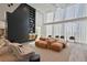 Grand lounge featuring high ceilings, statement lighting, and ample seating arrangements at 3324 Peachtree Rd # 2717, Atlanta, GA 30326