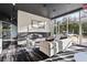Comfortable lounge with large windows, modern fireplace and stylish furnishings at 3324 Peachtree Rd # 2717, Atlanta, GA 30326