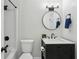 This charming bathroom has a tub and modern sink and fixtures at 63 Fulton Se St, Atlanta, GA 30312