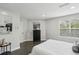 Bright bedroom offers a comfortable space with ample natural light, neutral colors and closet with storage at 63 Fulton Se St, Atlanta, GA 30312