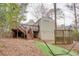 This backyard features a spacious deck with stairs and a small grassy area, perfect for outdoor activities at 148 Murray Hill Ne Ave, Atlanta, GA 30317