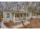 Charming single-story home with a welcoming front porch and well-maintained landscaping at 148 Murray Hill Ne Ave, Atlanta, GA 30317