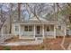 Charming single-story home with a welcoming front porch and well-maintained landscaping at 148 Murray Hill Ne Ave, Atlanta, GA 30317