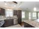 Modern kitchen boasts updated appliances, granite countertops, and ample cabinet space for storage at 148 Murray Hill Ne Ave, Atlanta, GA 30317