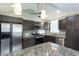 Well-lit kitchen featuring stainless appliances and granite countertops, perfect for cooking and entertaining at 148 Murray Hill Ne Ave, Atlanta, GA 30317