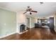 Spacious living room with fireplace, open to the modern kitchen at 148 Murray Hill Ne Ave, Atlanta, GA 30317