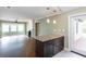 Open-concept living room features hardwood floors, a fireplace, and plenty of natural light at 148 Murray Hill Ne Ave, Atlanta, GA 30317