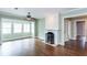 Bright and airy living room features hardwood floors and a classic fireplace at 148 Murray Hill Ne Ave, Atlanta, GA 30317